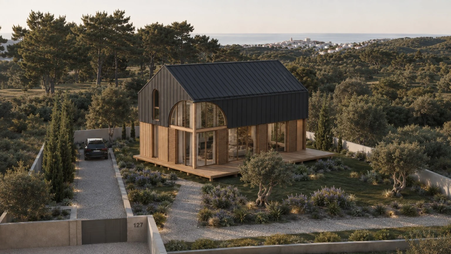 Étude HAVRE dans un paysage méditerranéen, maison contemporaine en métal sombre et bois.